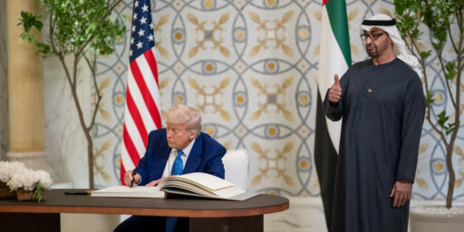 President Donald Trump signs the guest book at Qasr Al Watan in Abu Dhabi, United Arab Emirates, Thursday, May 15, 2025. (Official White House Photo by Daniel Torok)